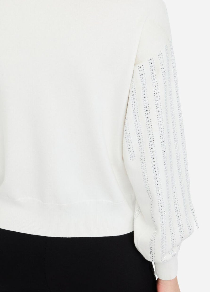 Jumper with gemstones
