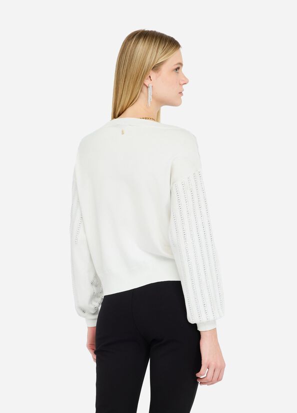 Jumper with gemstones