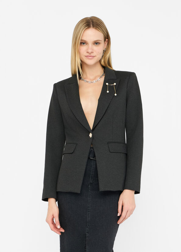 Blazer with brooch detail