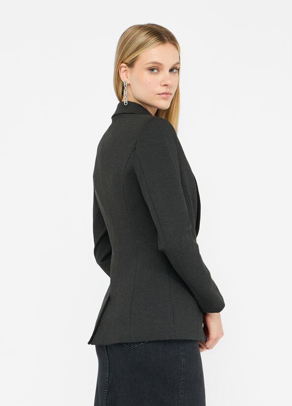 Blazer with brooch detail